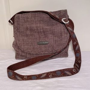 KEEN water resistant crossbody purse with adjustable straps in brown.